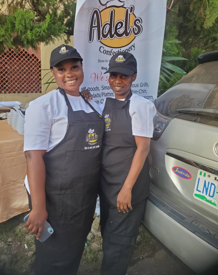 Adel's Confectionery team at an event stand